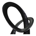 this sculpture is both simple and elegant. Place on your table or mantle as a statement piece.