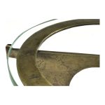the Halvorsen has a glass top that shows off the fresh metalwork of this classy accent table.